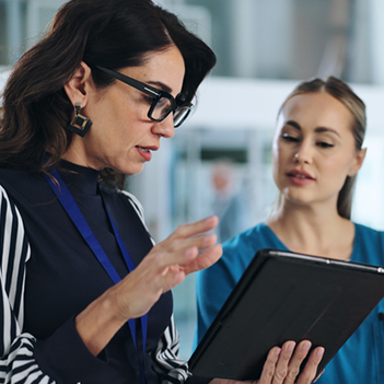 Two healthcare looking at the new resource